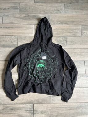 Black Graphic Hoodie with Neon Green Orbital Design